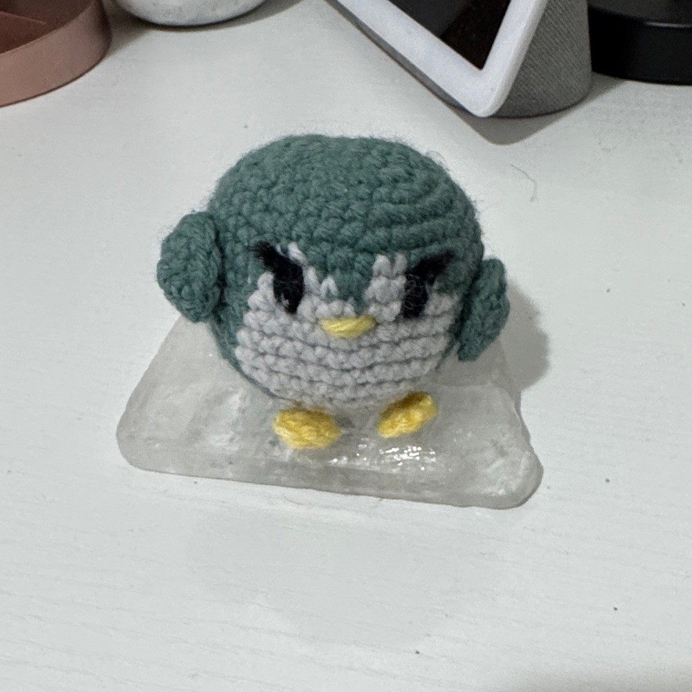 Handcrafted teal and light blue Crochet penguin